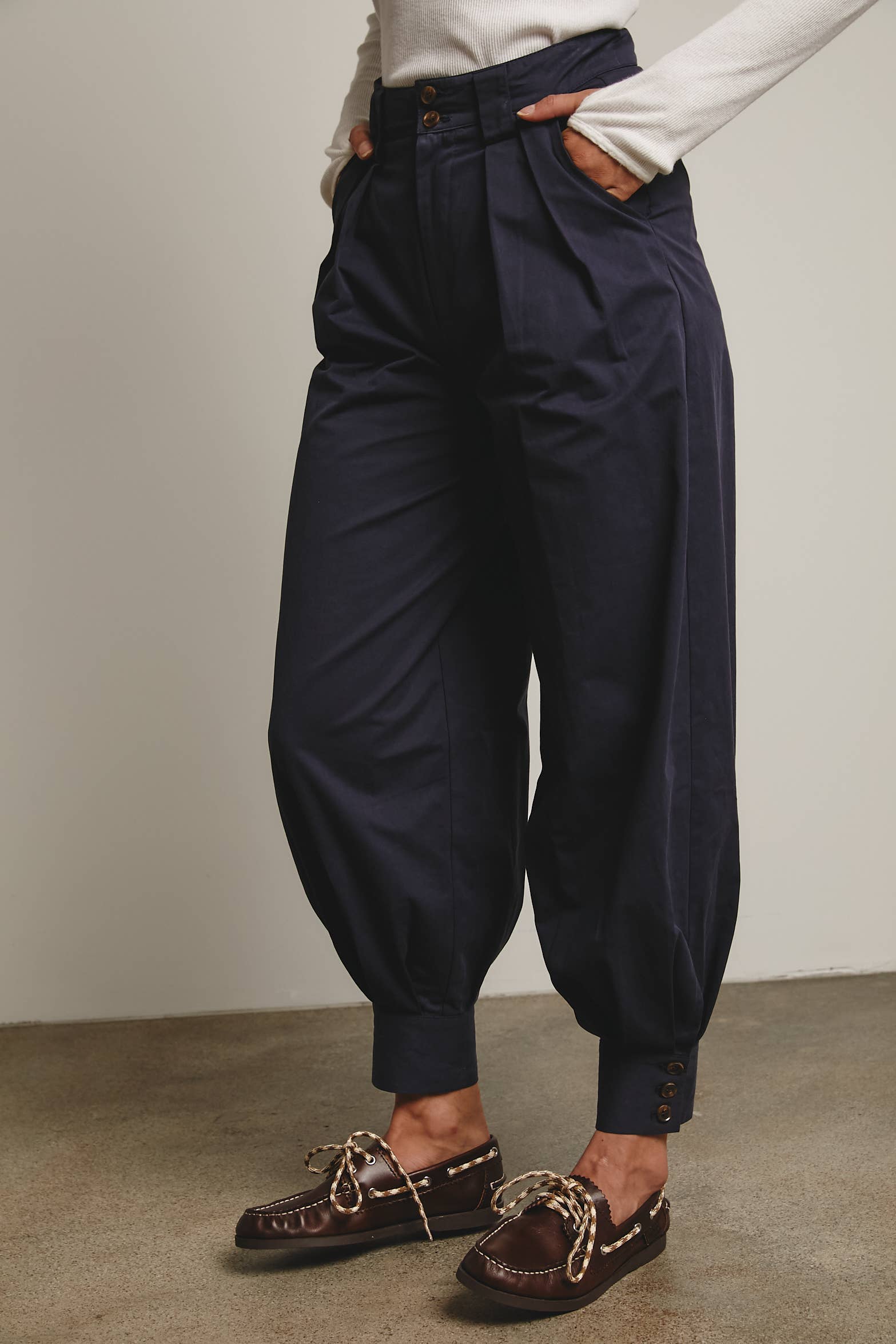 High-Waisted Pleated Tapered Pants with Button Cuff Detail