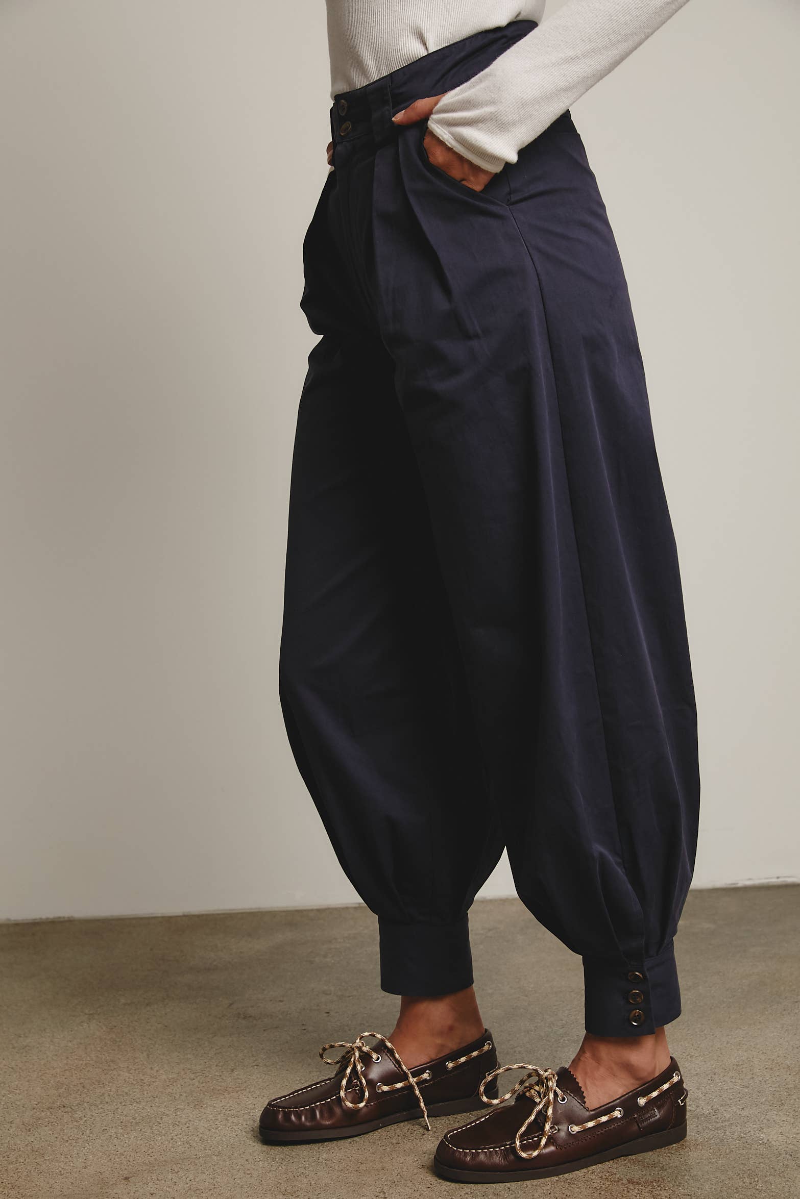 High-Waisted Pleated Tapered Pants with Button Cuff Detail