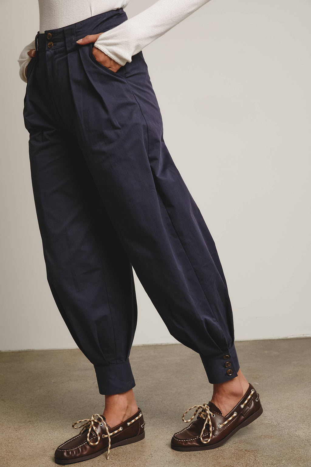 High-Waisted Pleated Tapered Pants with Button Cuff Detail