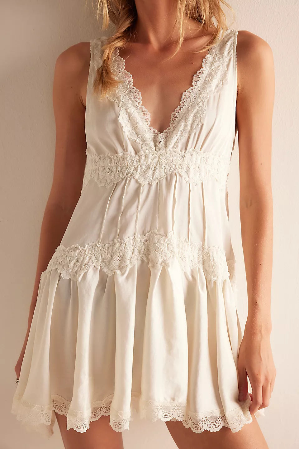 Cream lace detail dress close-up bodice